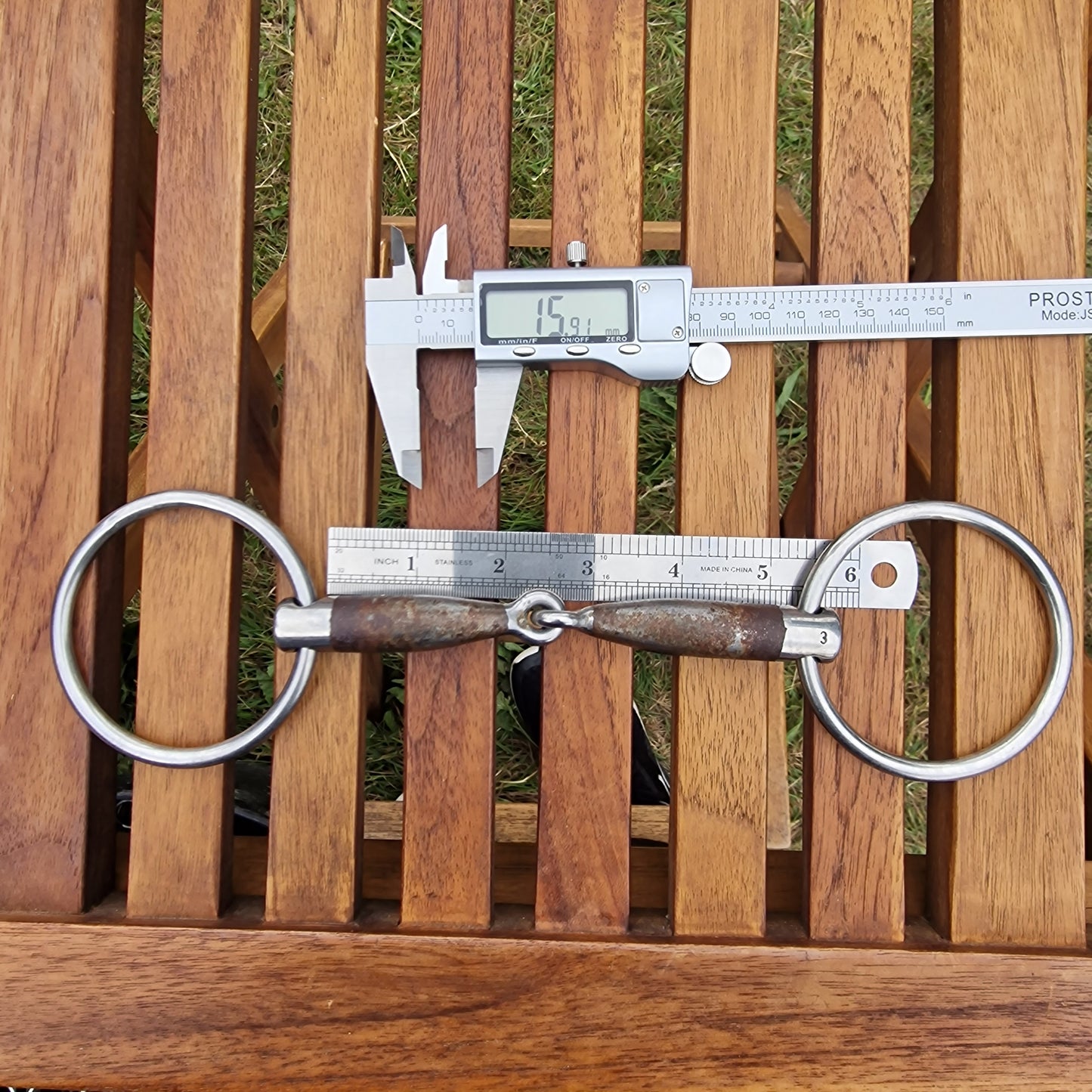 5.25" trust jointed loose ring snaffle bit B695