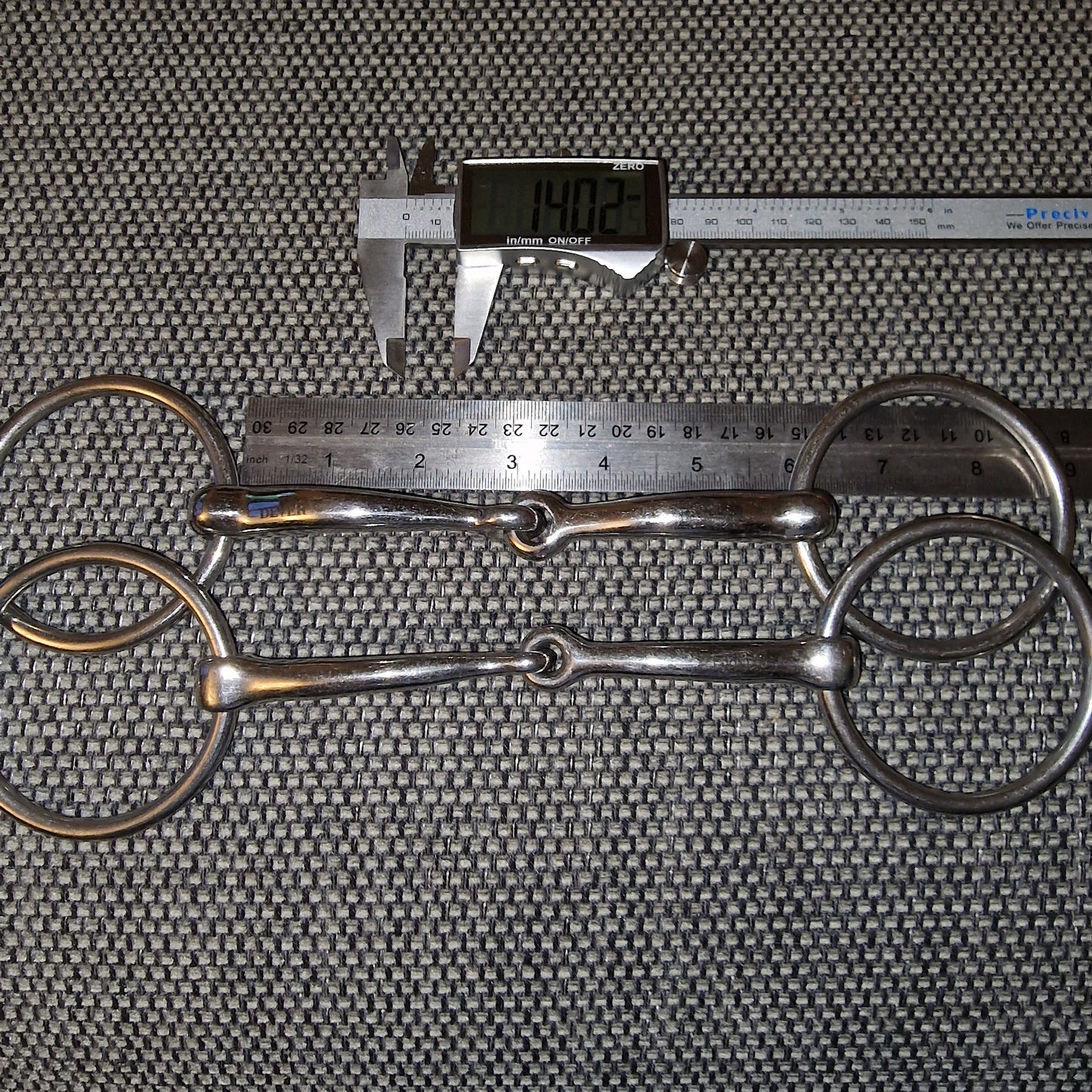 5.75" loose ring anatomical curve single jointed snaffle bit B525