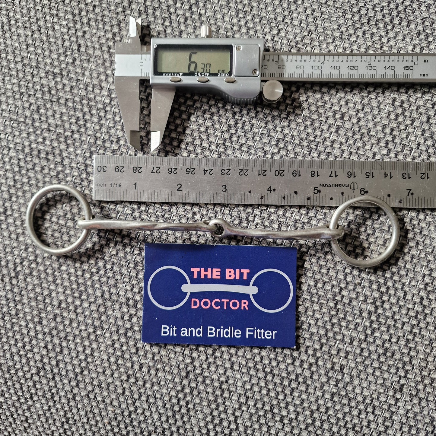5.25" twisted overcheck loose ring snaffle bit B723