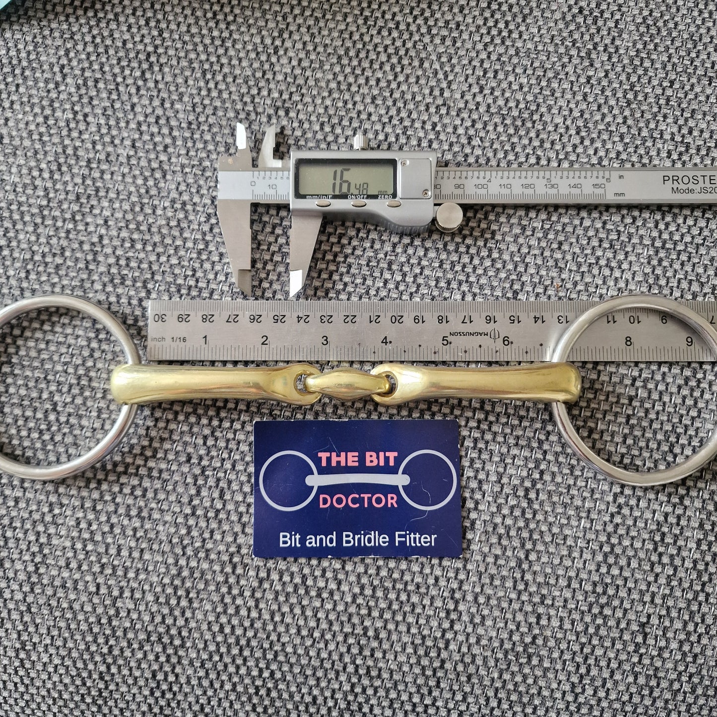 6.5" anatomical copper lozenge loose ring snaffle bit B75