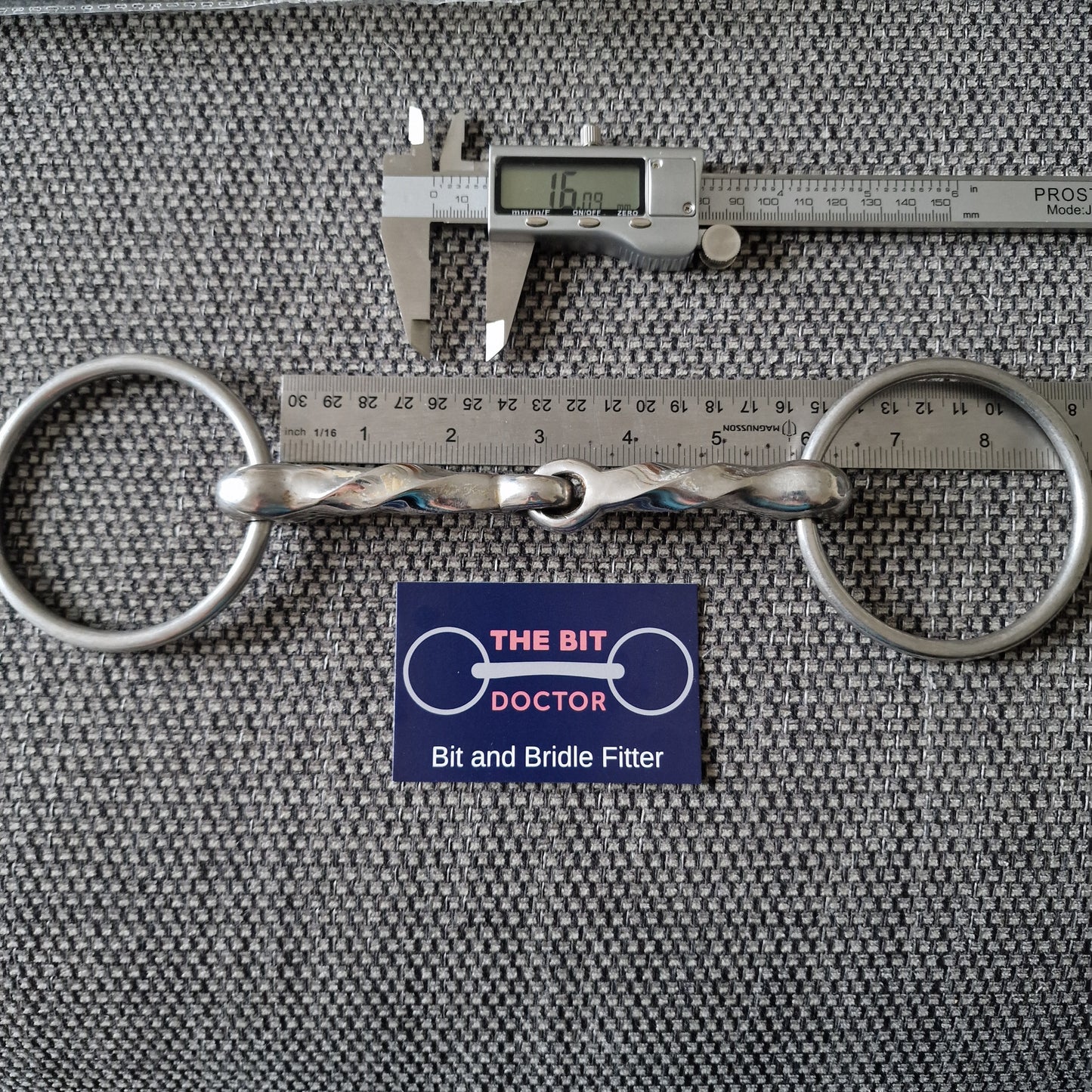 5.75" twisted jointed loose ring snaffle bit B533