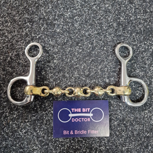 Hanging cheek copper waterford snaffle bit with neat short sides.