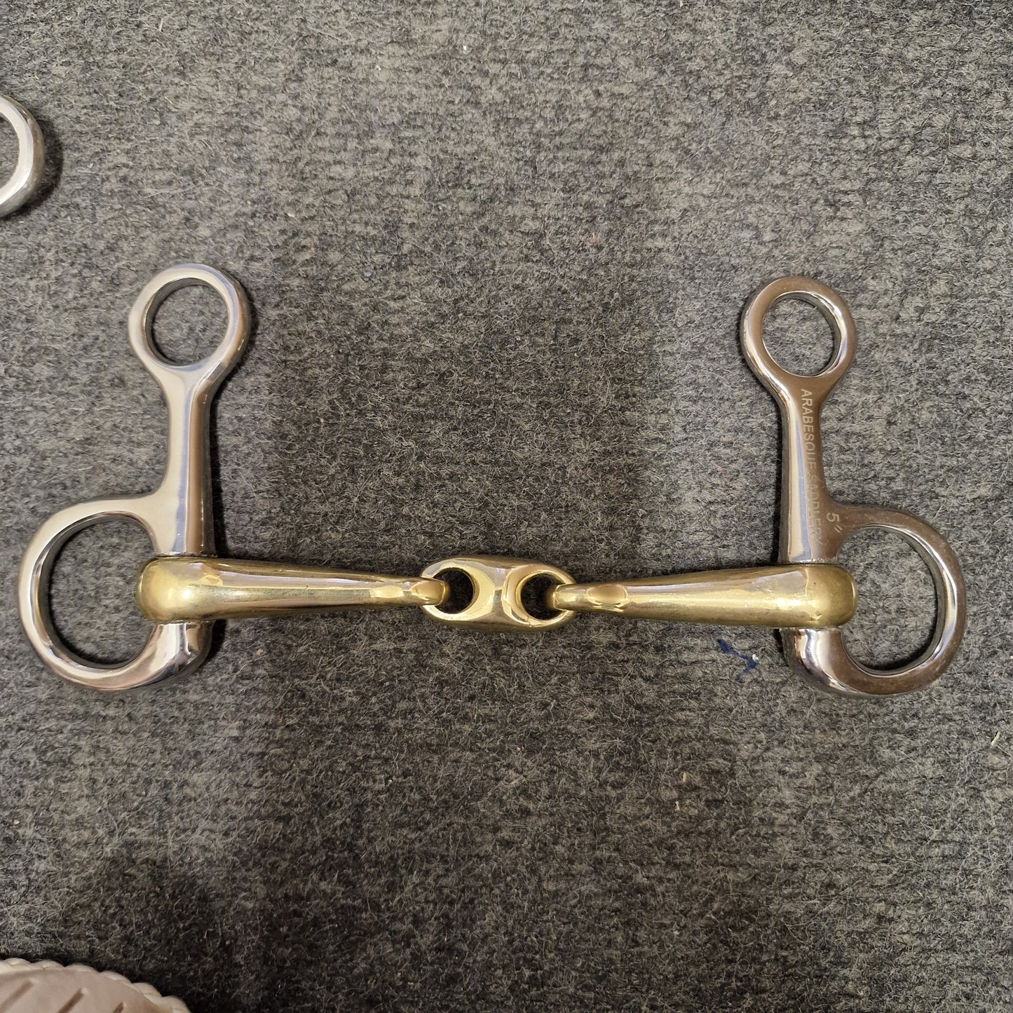 Hanging cheek copper lozenge snaffle bit with small neat sides
