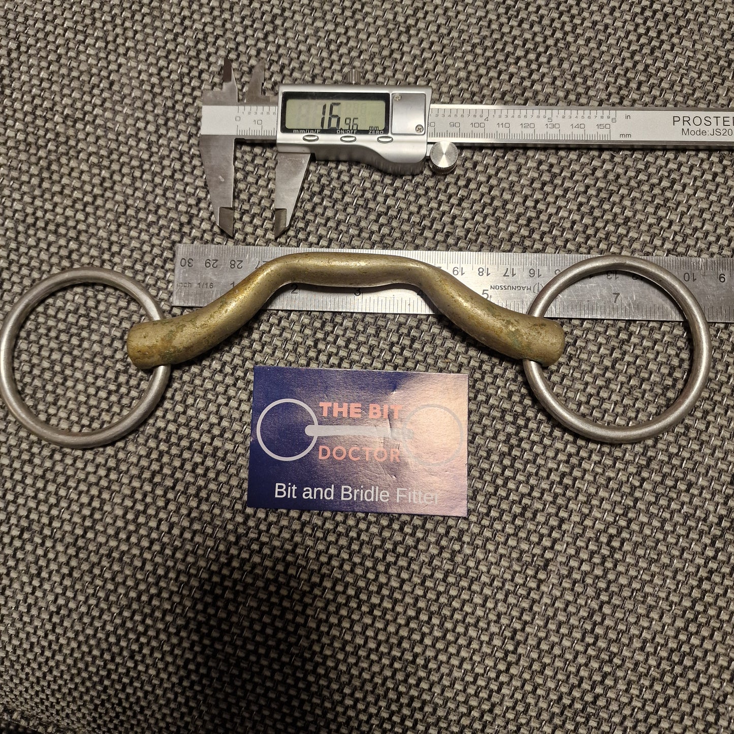 5.5" copper correctional port loose ring snaffle bit B1056